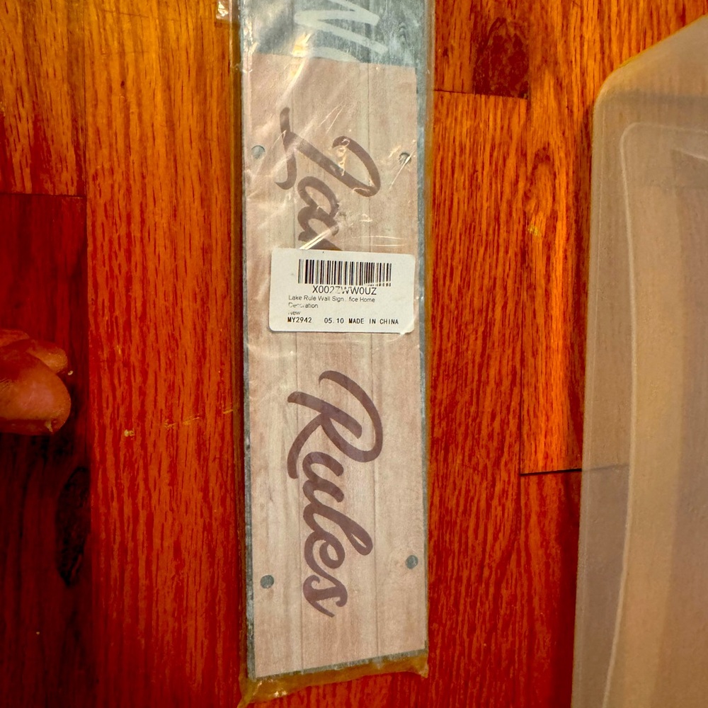 Wooden Sign with lake rules text